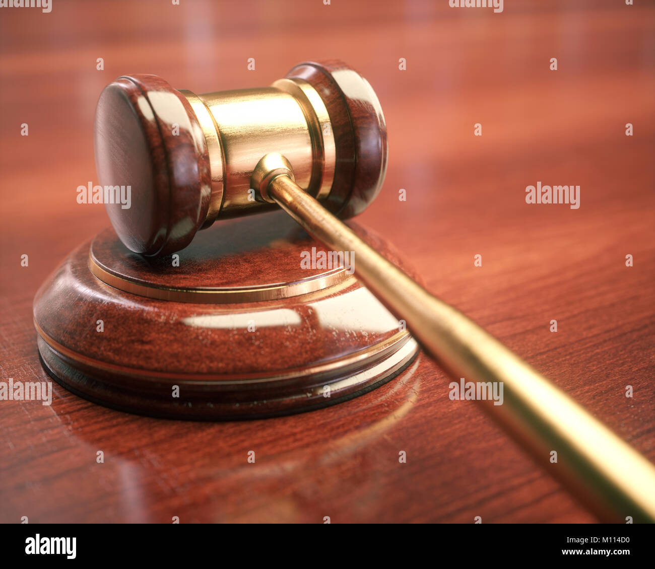 Gavel, judge hammer. Close up of wooden hammer with gold details. Concepts of law and auction. Stock Photo