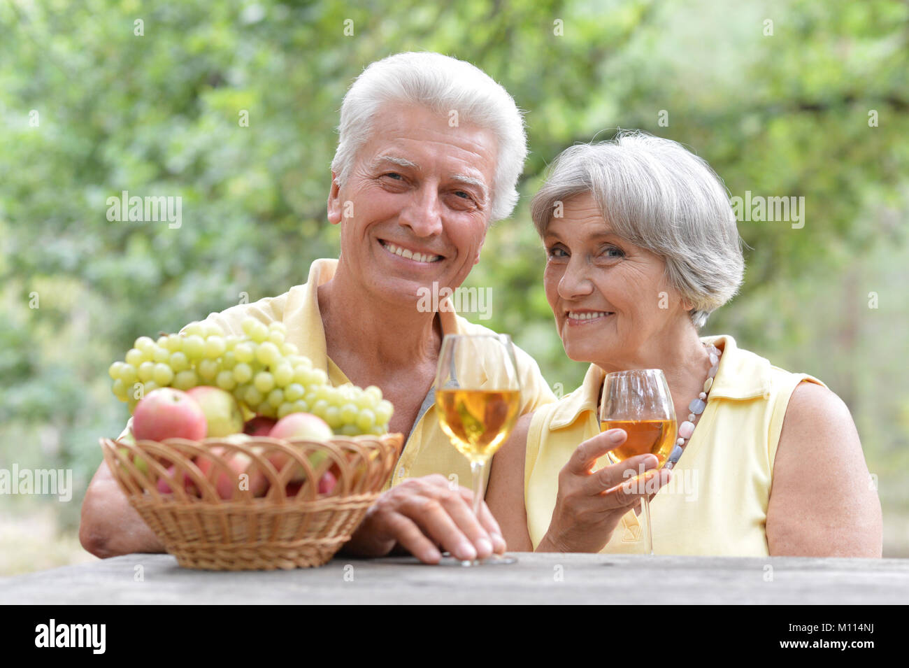 elderly couple drinking wine Stock Photo