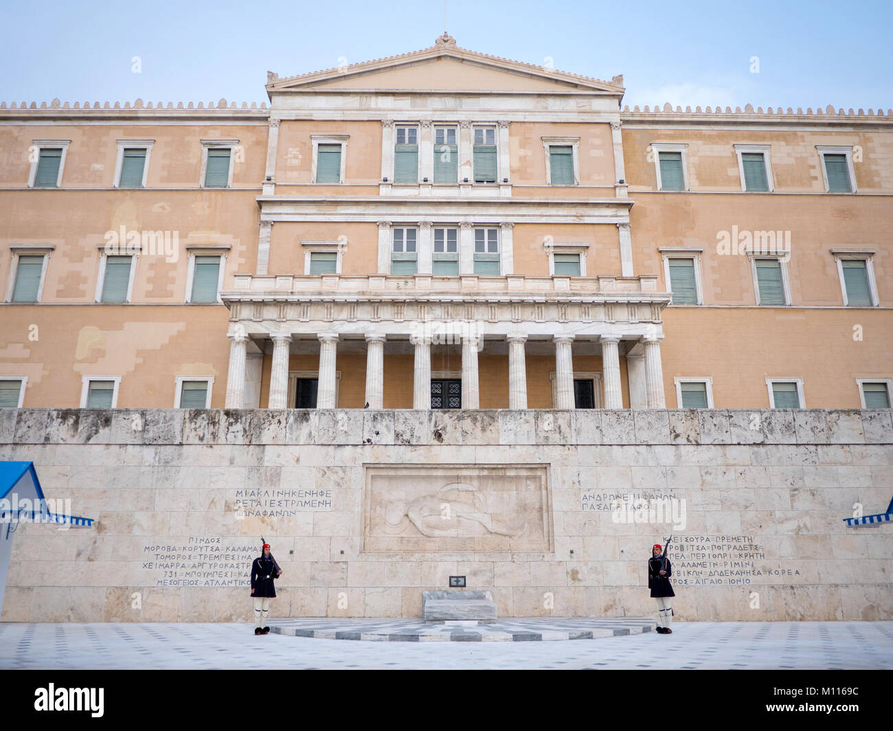 ATHENS,GREECE - MARCH 26, 2016: The Greek Presidential guards called Tsoliades dressed in traditional uniform at the monument of the unknown soldier i Stock Photo