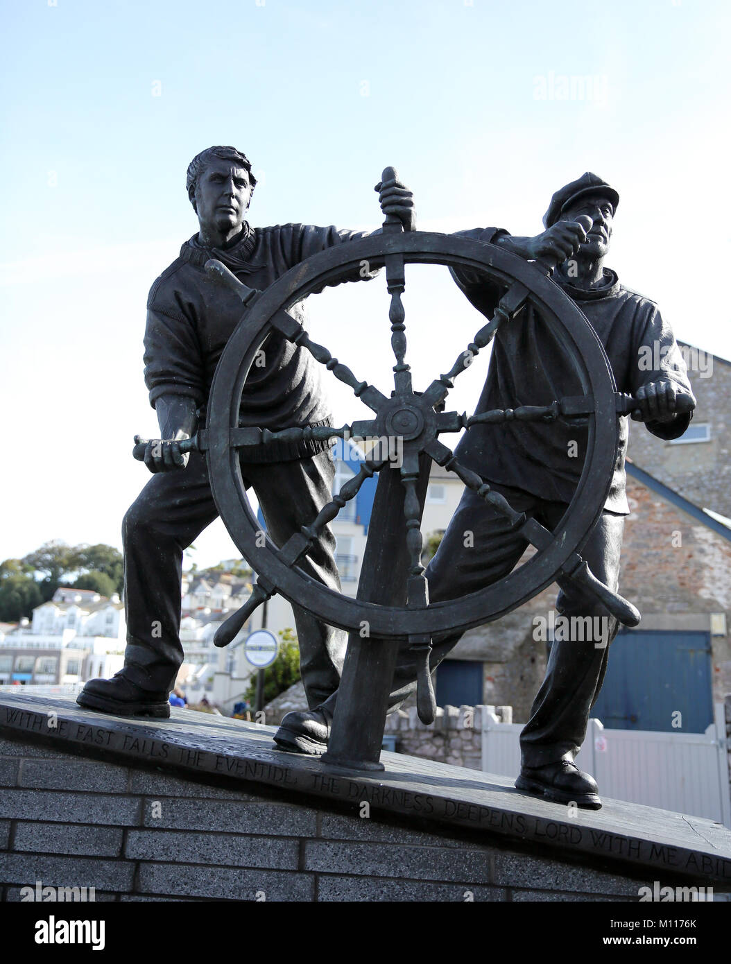 'Man and Boy', a statue by Elizabeh Hadley in Brixham, Devon UK. It was unveiled on 26.11.16. It is based on 'The Wheel', an etching by Arthur Brisco. Stock Photo