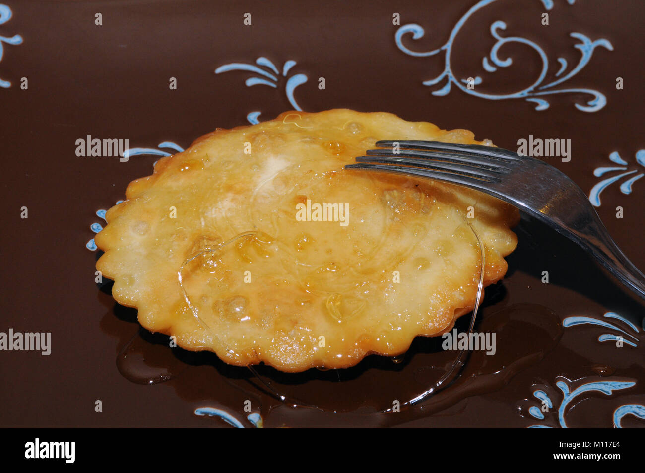 Seadas, local cheese and honey dessert pie, Sardinia, Italy Stock Photo