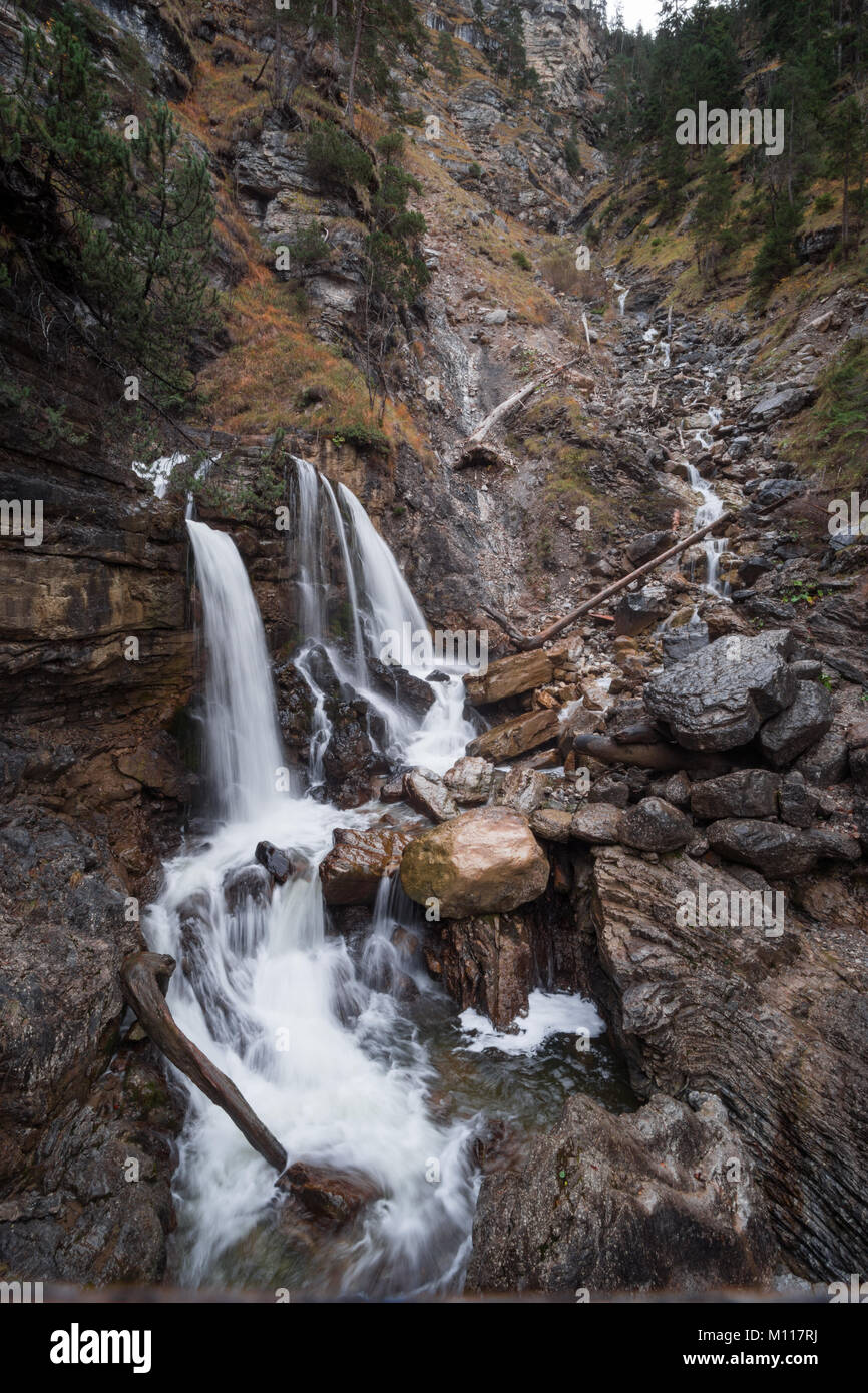 German waterfall - Kuhfluchtwasserfall - near the german alps while autumn. Stock Photo