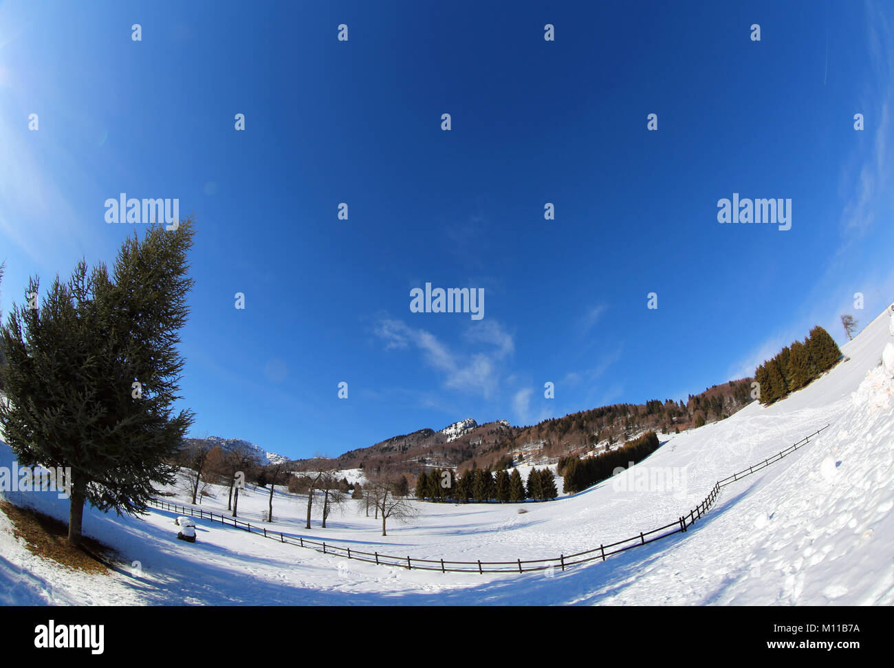 panorama mountains with wide fish eye lens and white snow in winter ...