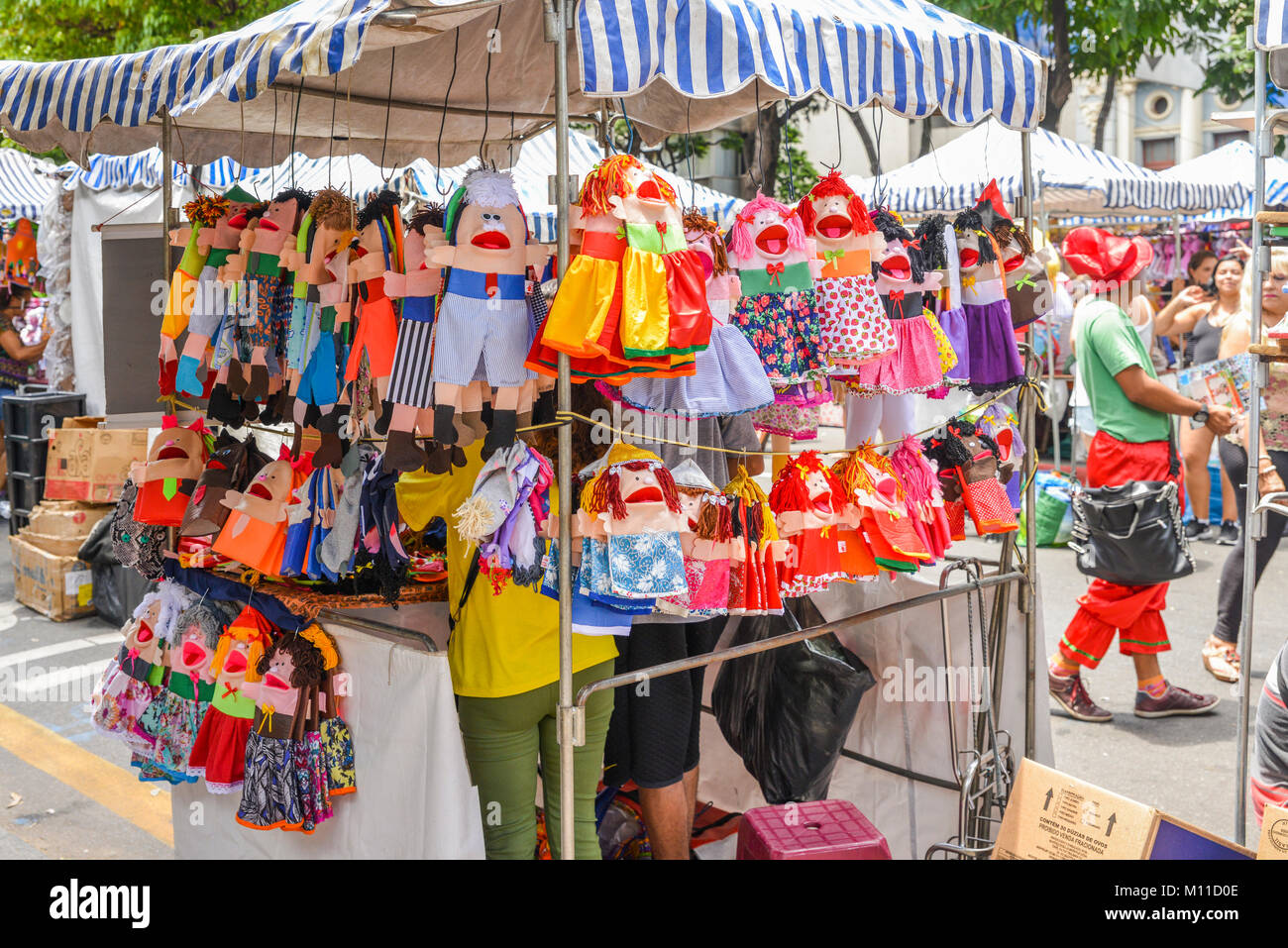 Ventriloquist toys for sale on display at a street market in Belo