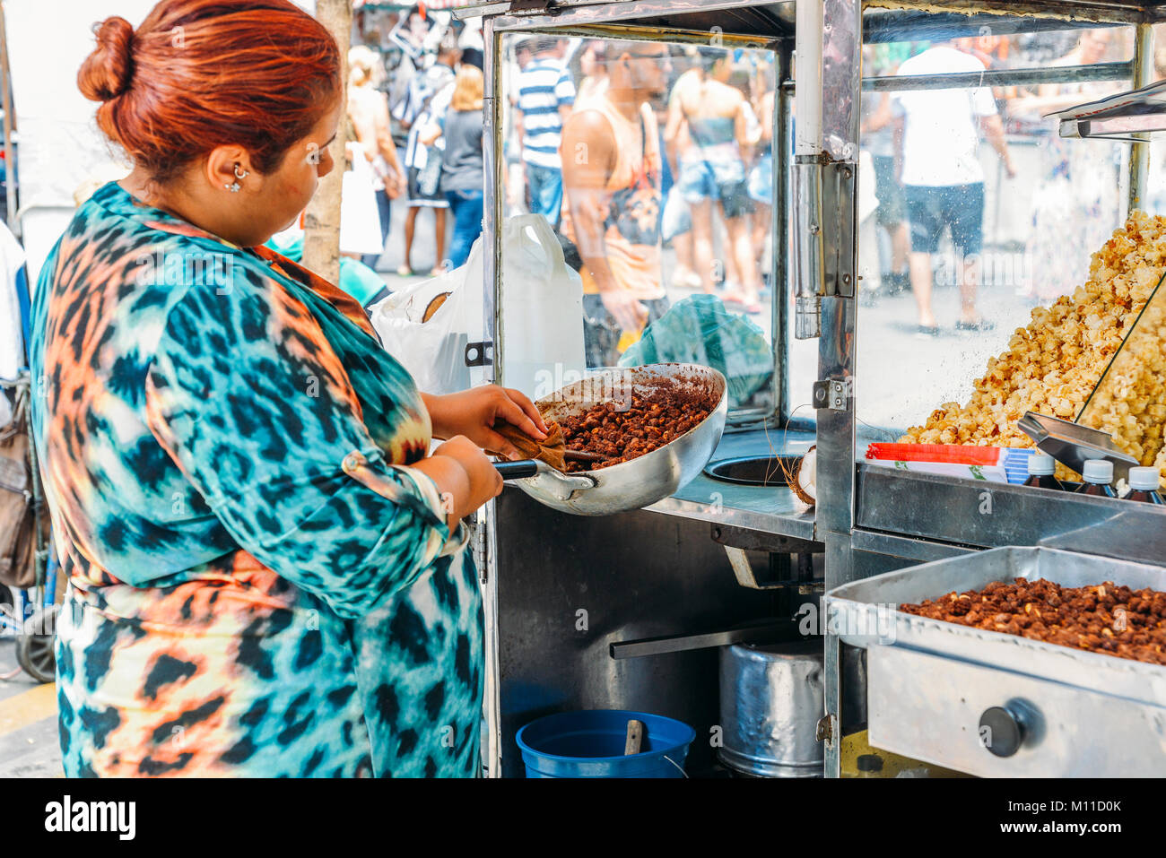Woman sells popcorn and peanuts at a street market in Belo Horizonte, Minas Gerais, Brazil Stock Photo