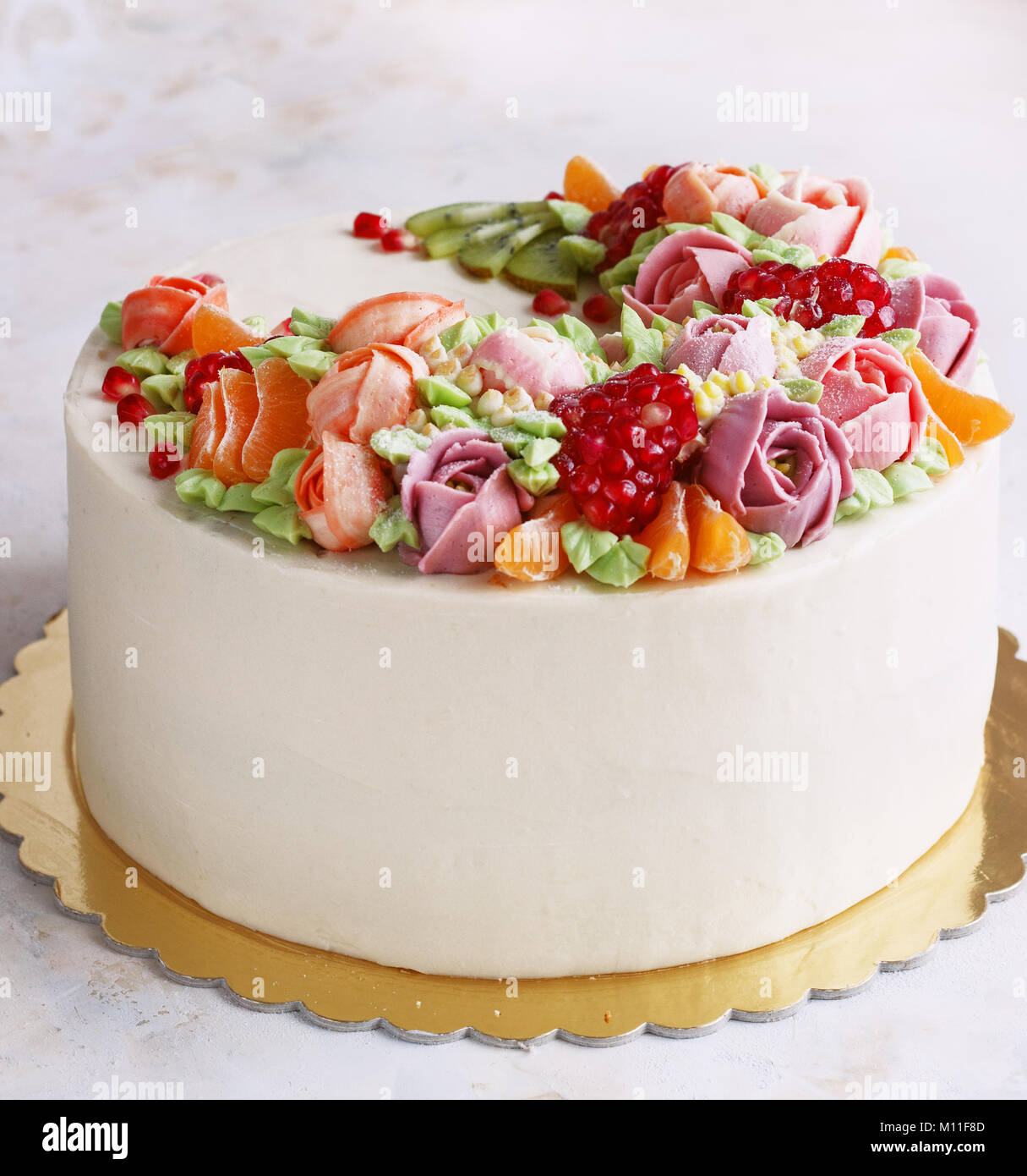 Festive Cake With Cream Flowers And Fruits On A Light Background