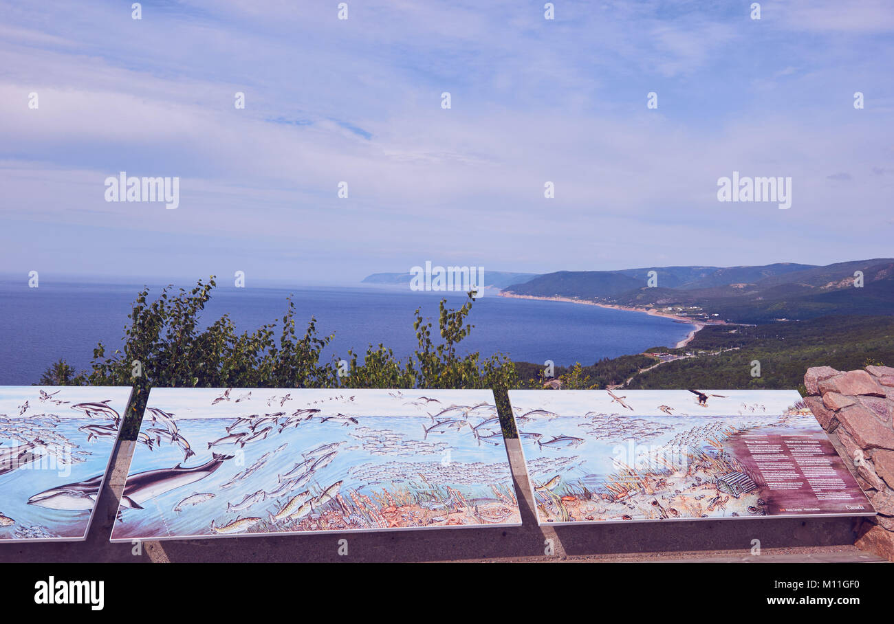 Viewing platform with whale watching information boards above the coast, Cape Breton Highlands National Park, Cape Breton Island, Nova Scotia, Canada Stock Photo