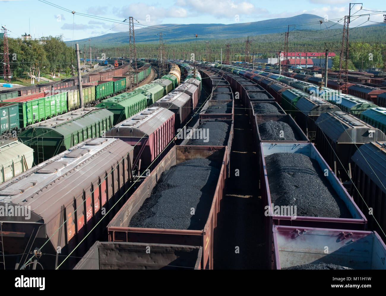 Kandalaksha, Russia - August 28, 2012: Cars with coal and oil of station Stock Photo