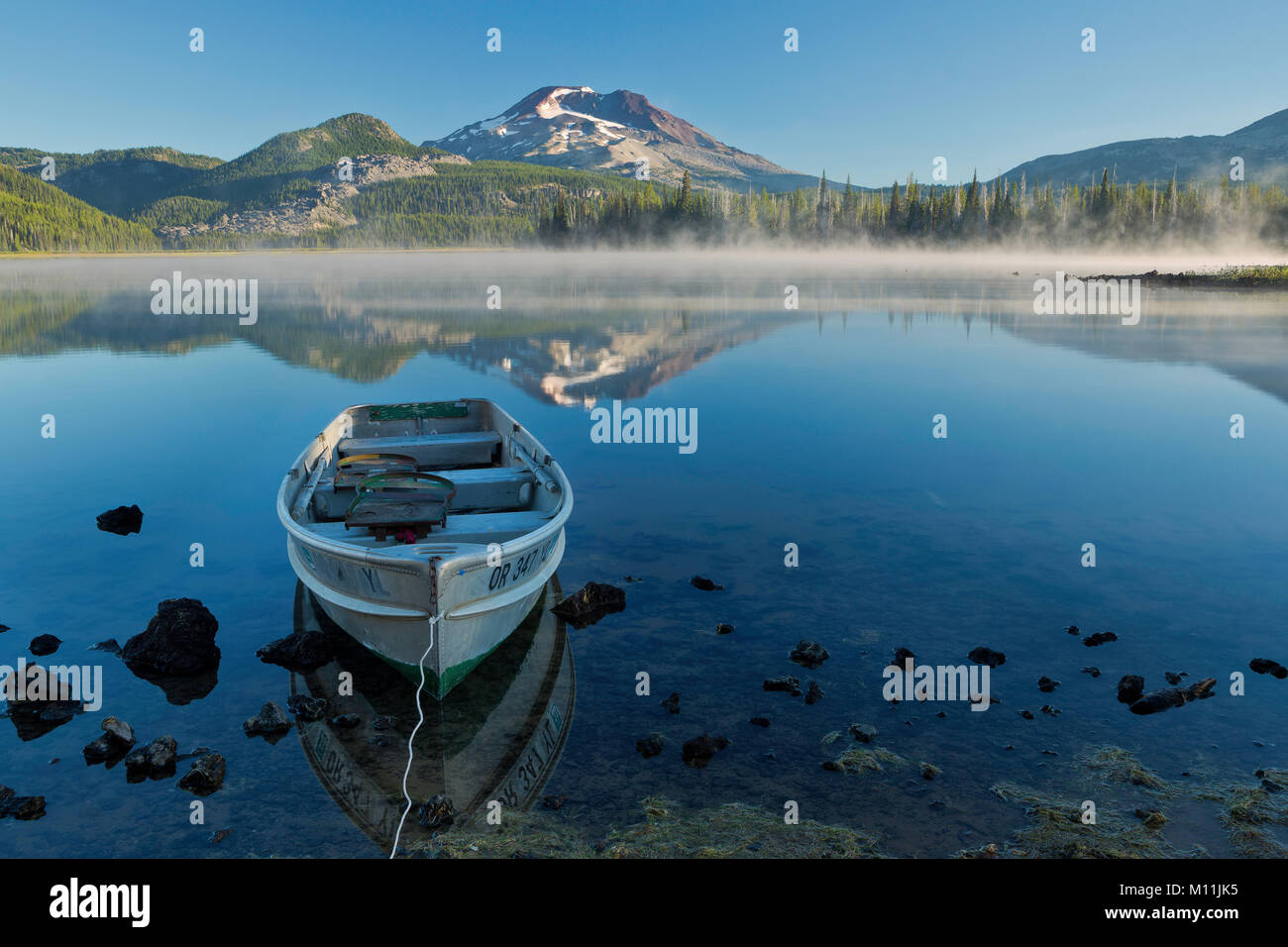 A boat tethered to the shore at Sparks Lake in central Oregon. USA Stock Photo