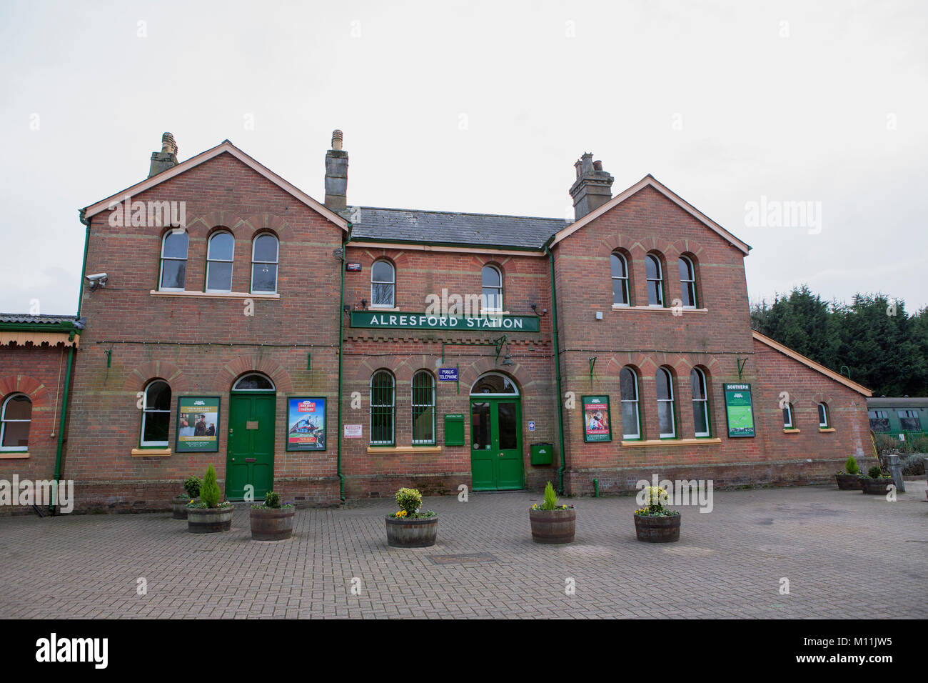 Exterior view of the heritage railway station on the Watercress line at Alresford. Grey winters day with no people in sight Stock Photo