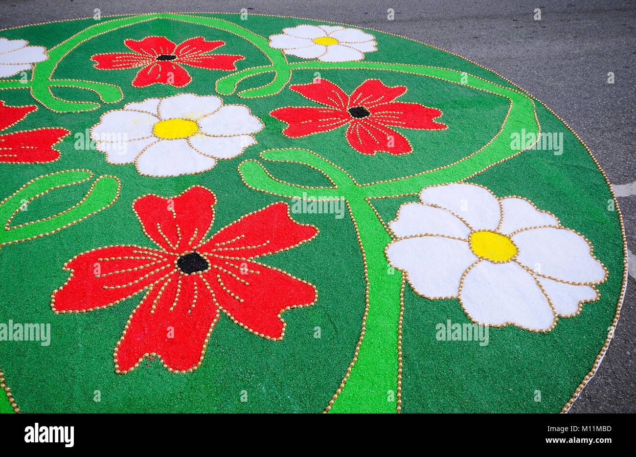 PRAVIA, SPAIN - JUNE 4: Carpets of flowers for the celebration of Corpus Christi  in June 4, 2015 in Pravia, Spain. During the past two months, fifty  Stock Photo