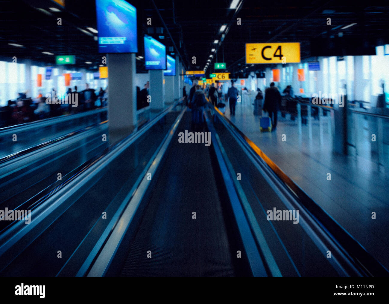 Airport and transportation concept of stressful situation, captured at Amsterdam's Schiphol Airport, Netherlands Stock Photo
