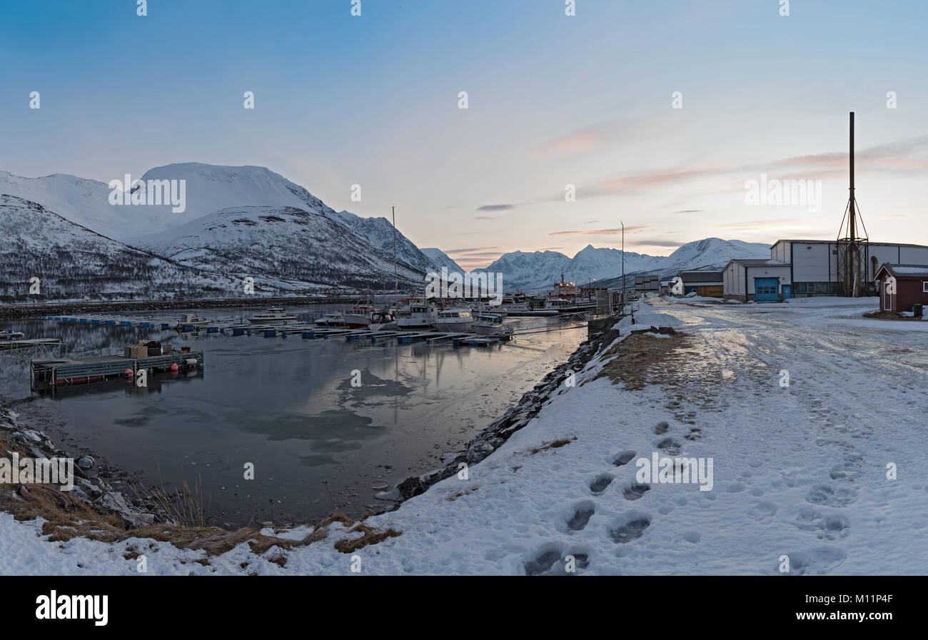 Boats in the sheltered harbor at Nord-Lenangen, Lyngen, Troms county, Norway Stock Photo