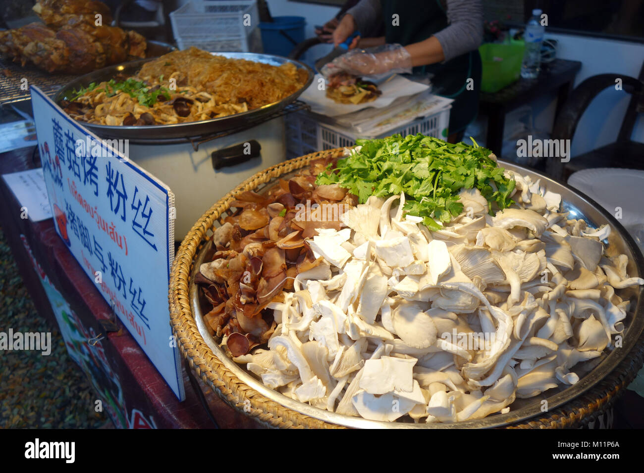 Mushrooms for sale at street food stall, night markets, Chiang Mai, Thailand. No PR or MR Stock Photo