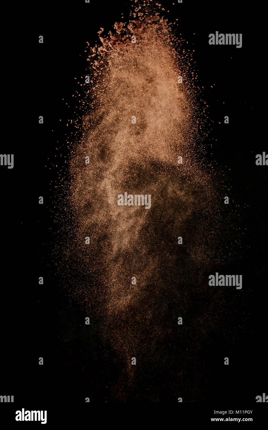 Cocoa powder explosion in motion hires stock photography and images Alamy