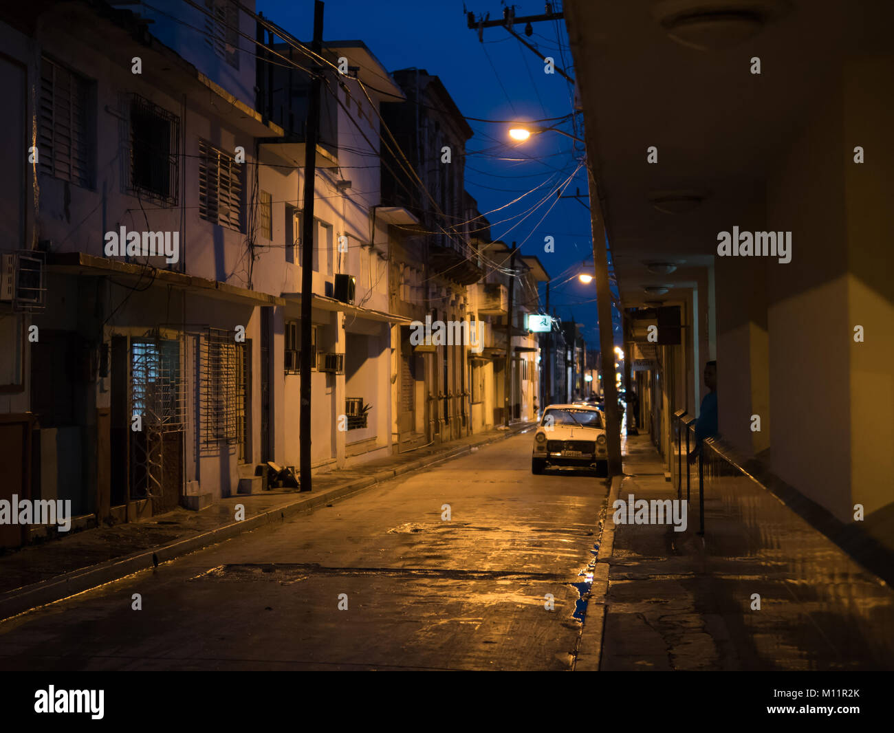 Gloomy Empty Wet Street In Holguin Cuba During Early Evening Time Stock Photo Alamy