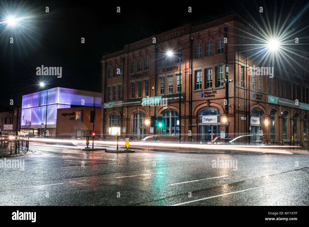 Wigan at Christmas. Very old fashioned scene here, looks great after being taken in the rain, reflects the light very well. Stock Photo