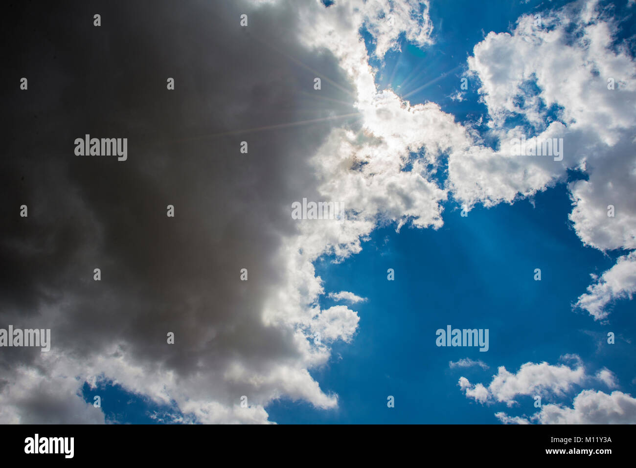 Blue sky with white and gray clouds Stock Photo Alamy