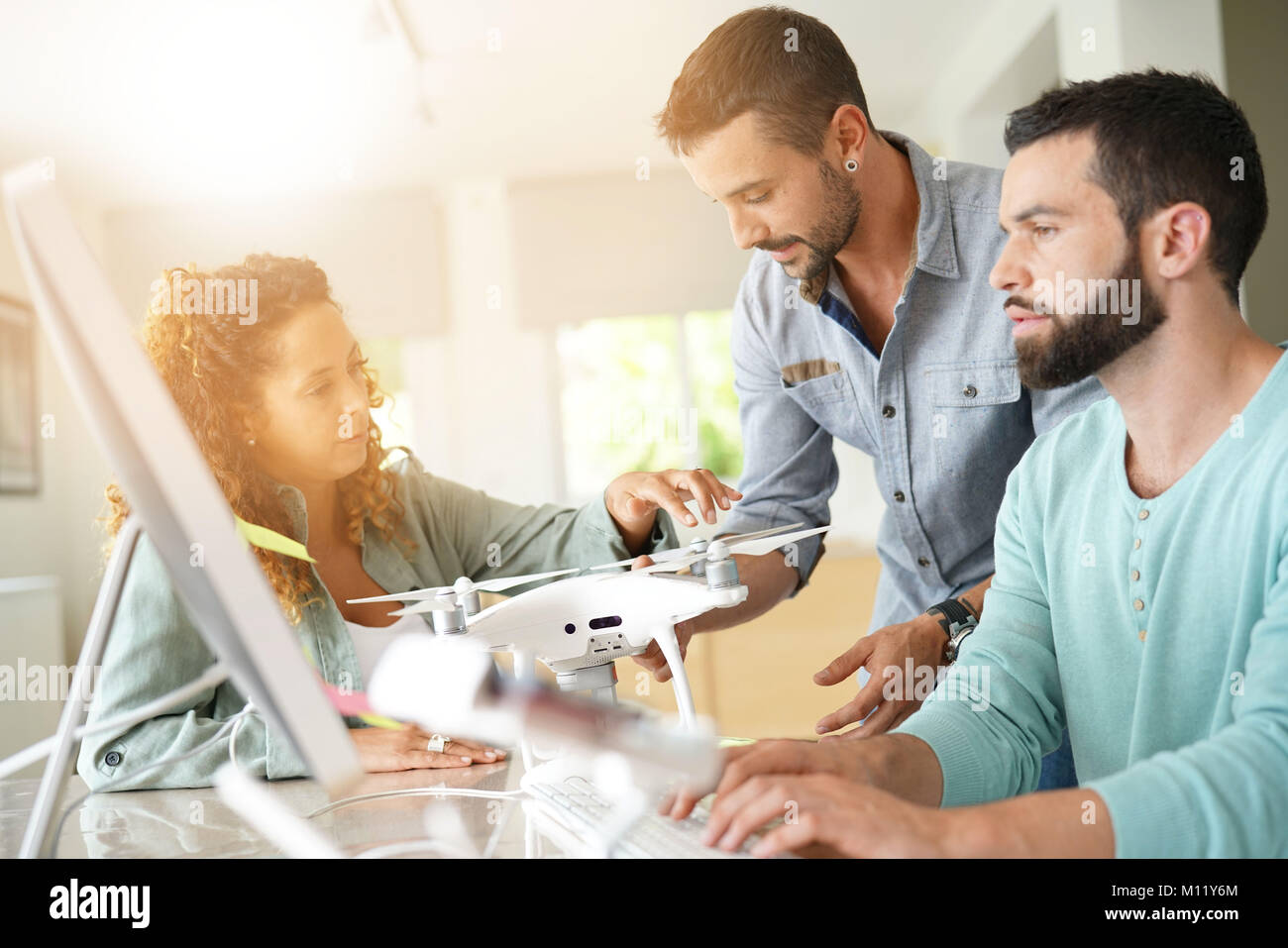 Startup people in office working on drone technology Stock Photo - Alamy