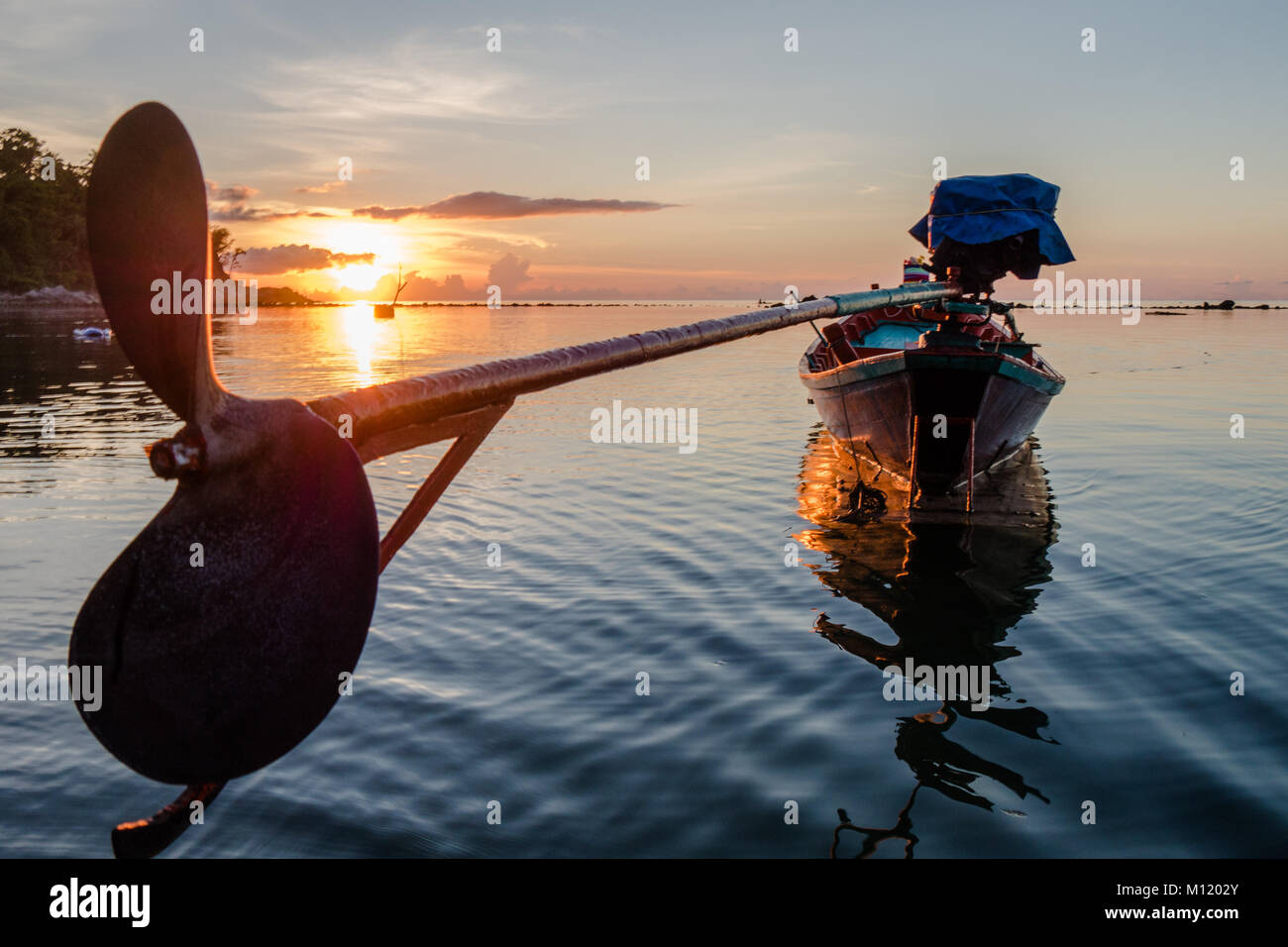 Fishing boat during sunset on Koh Samui, Thailand Stock Photo - Alamy