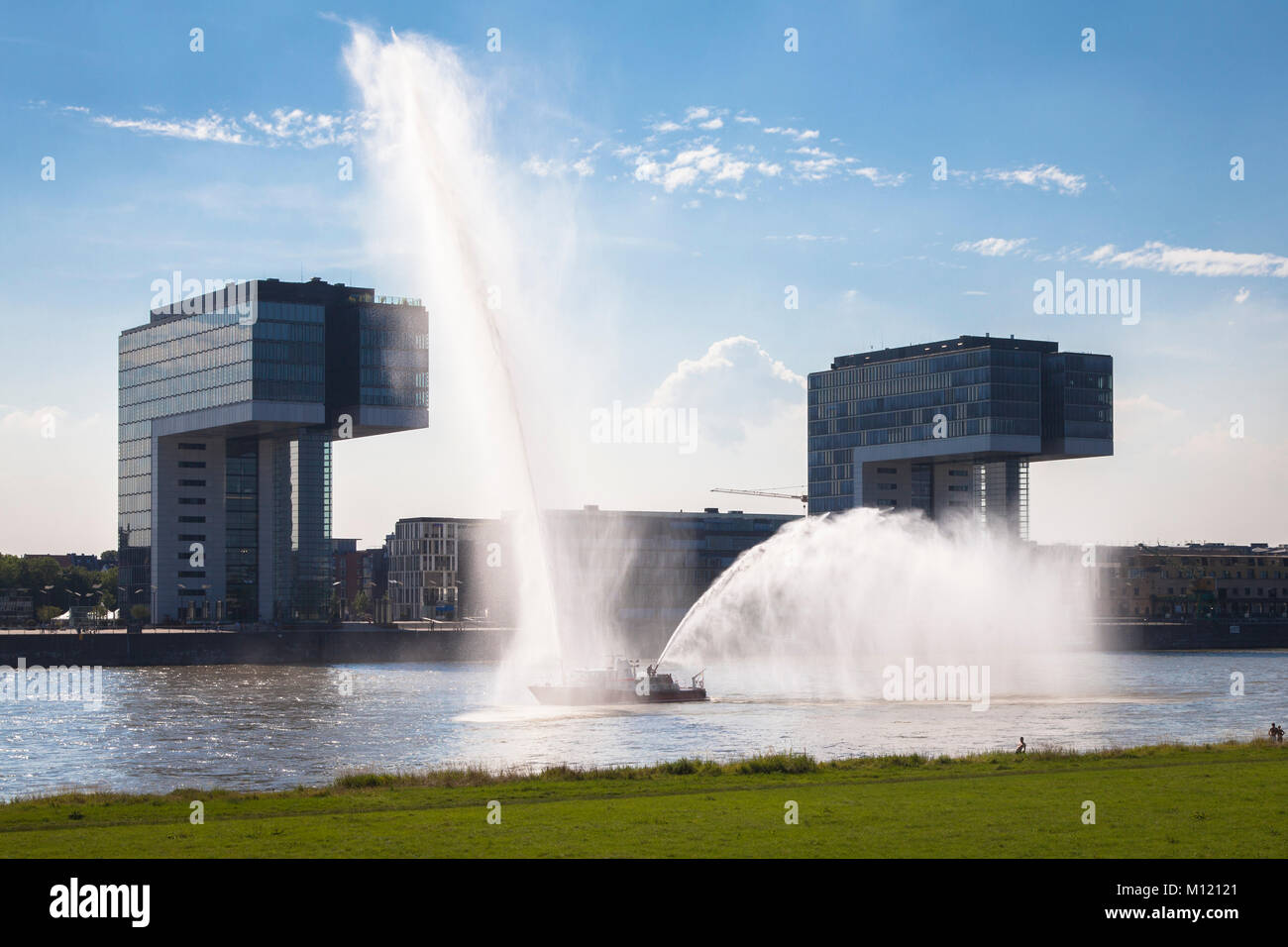 Germany, Cologne, firefighting boat duiring a fire drill on the river
