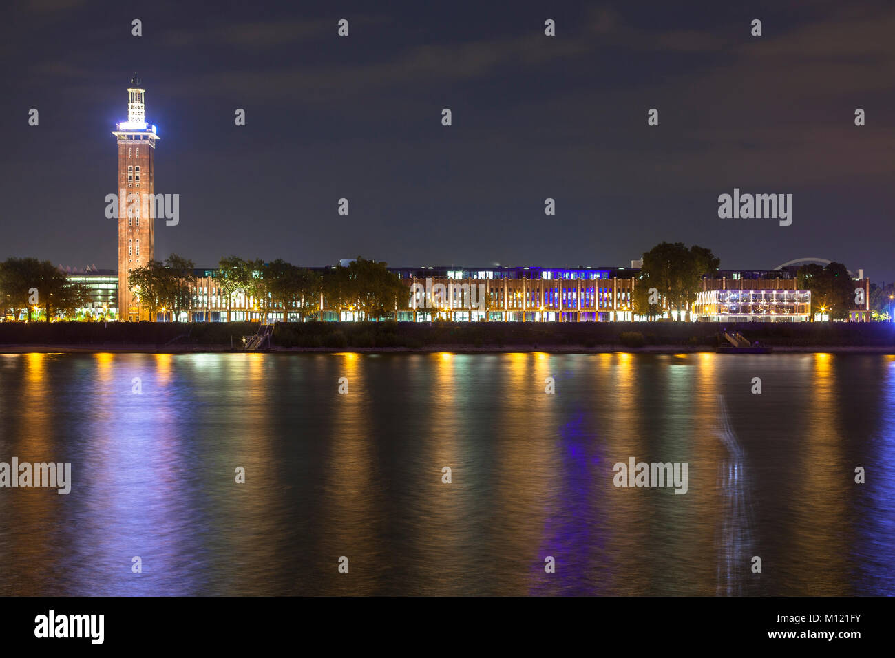 Germany, Cologne, view across the river Rhine to the old tower of the former exhibition center and the historic Rhine Halls in the district Deutz, tod Stock Photo