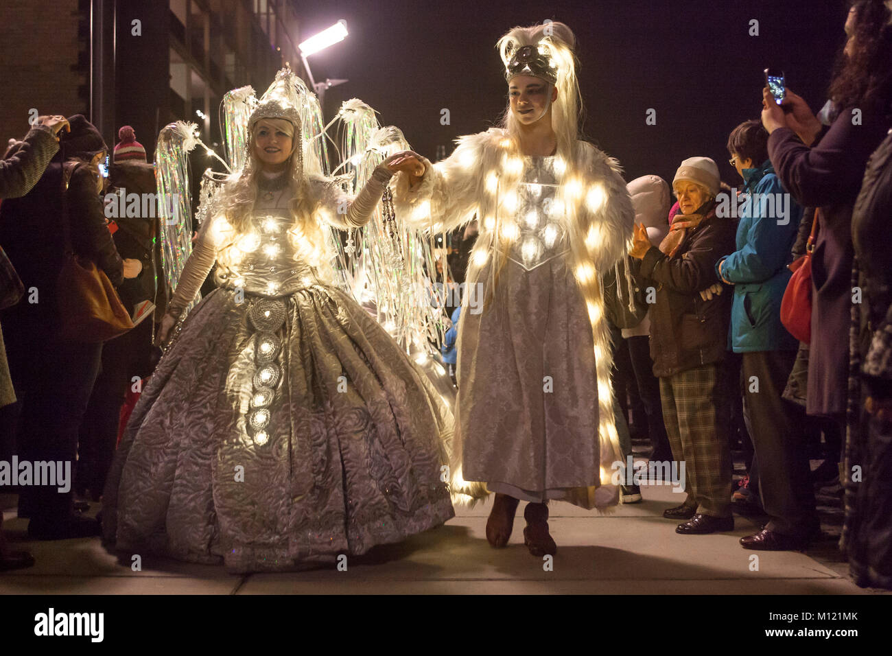 Germany, Cologne, the Christmas parade Vagalume at the Rheinau harbor, fairy, Christmas angel, gnomes and other fantasy creatures in illuminated costu Stock Photo
