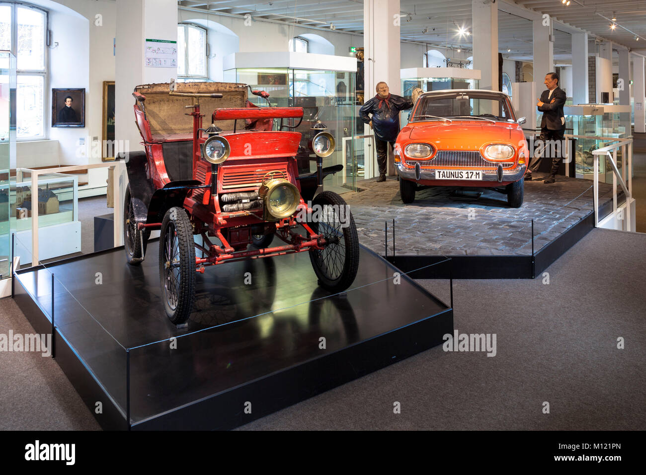 Germany, Cologne, Cologne City Museum, it provides an insight into the history of the city of Cologne, Ford cars with the Cologne figures Tuennes and  Stock Photo