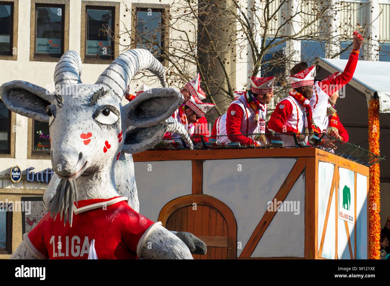 Germany, Cologne, carnival, Shrove Monday procession, float and players of the soccer club 1. FC Koeln.  Deutschland, Koeln, Karneval, Rosenmontagszug Stock Photo