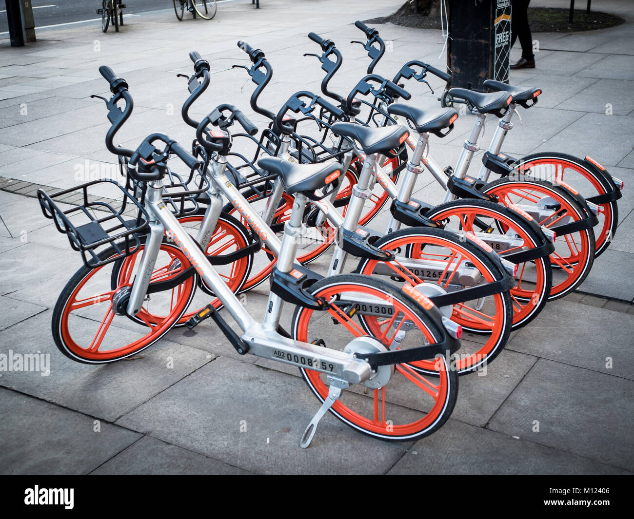 Mobike dockless hire bikes in London - Mobike is a Chinese bike hire company rolling out across the UK Stock Photo