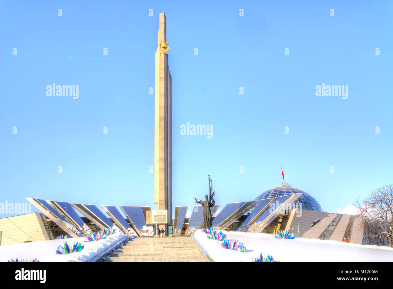 MINSK,  BELARUS - January 18.2017: Belarusian Great Patriotic War Museum and obelisk Minsk - Hero-City on boulevard of Winners Stock Photo