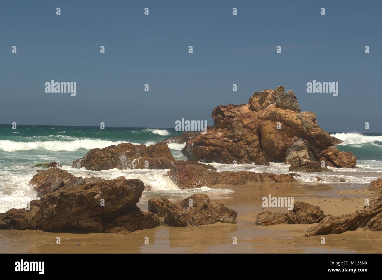 Rocks at the Beach Stock Photo - Alamy