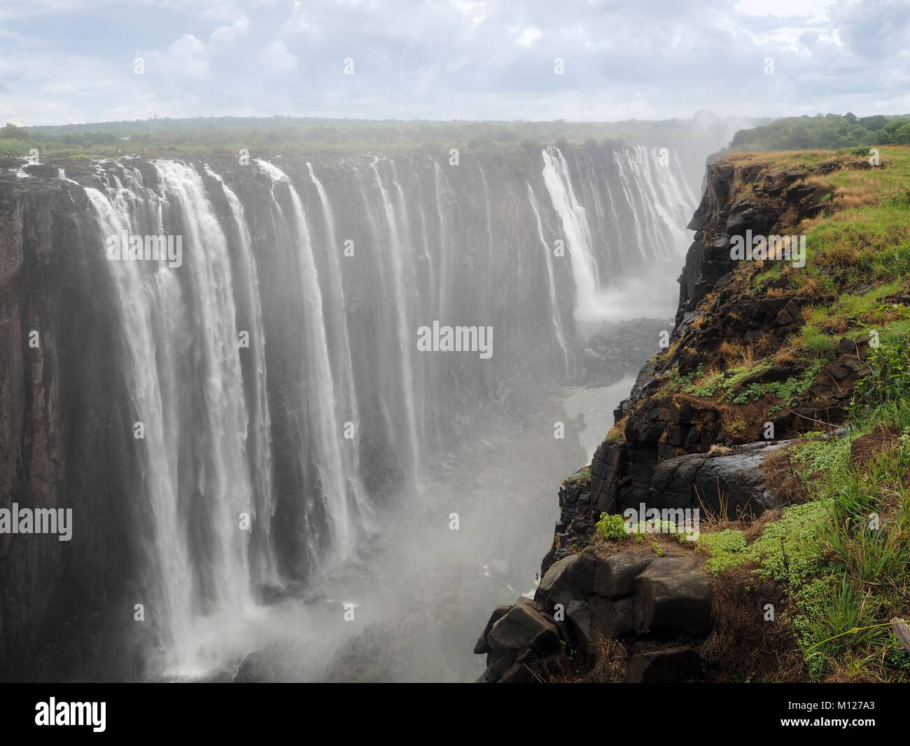 View of the Victoria Falls on the Zambezi River in Africa Stock Photo