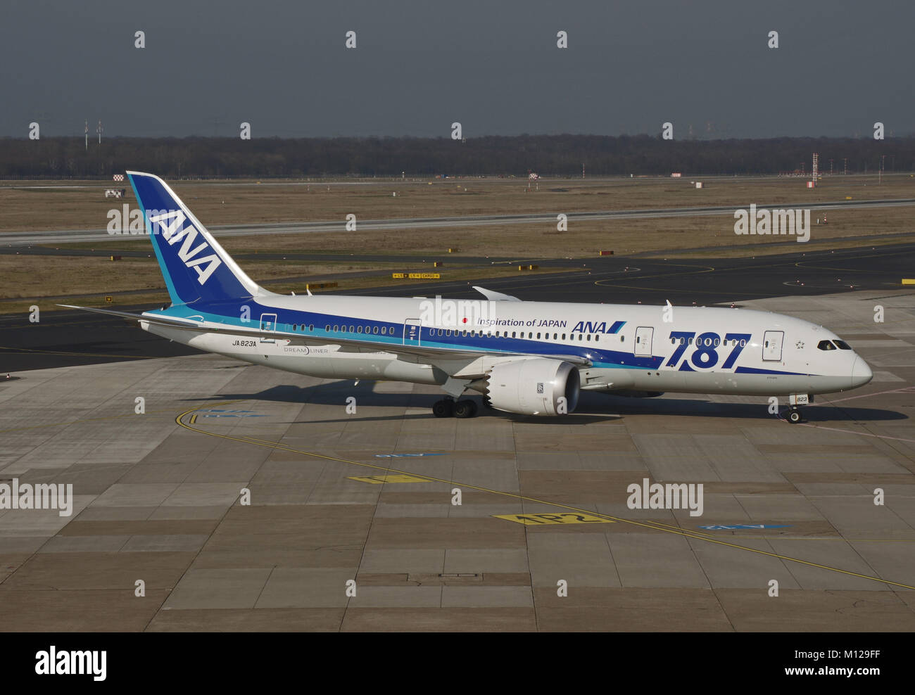Duesseldorf, Germany - March 17, 2015: Boeing 787-8 of All Nippon Airways (ANA) at the airport of Duesseldorf leaving taxiway Stock Photo