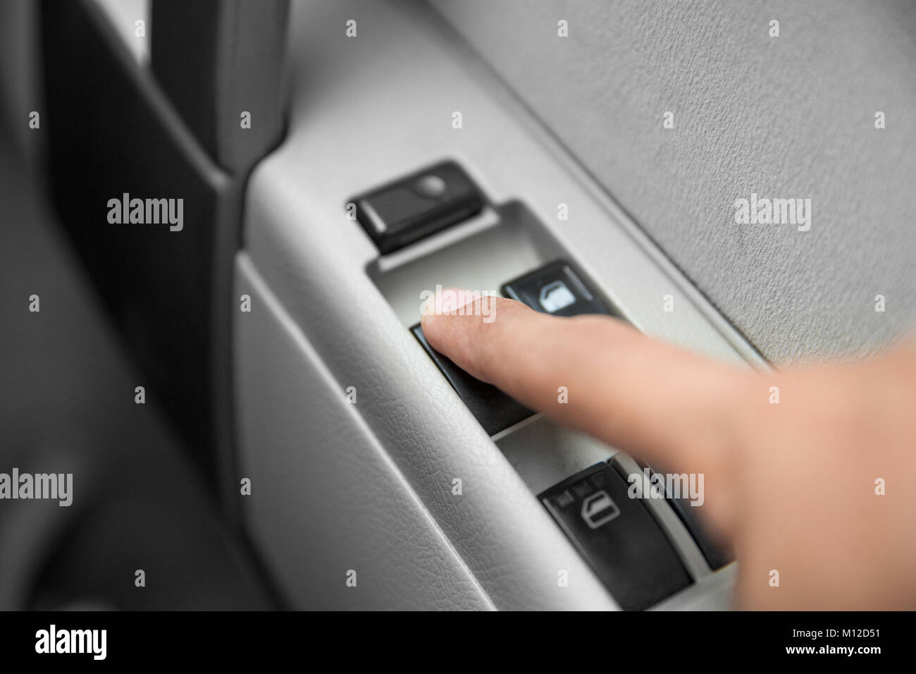 A portrait of windows controls and adjustments. Car window controls