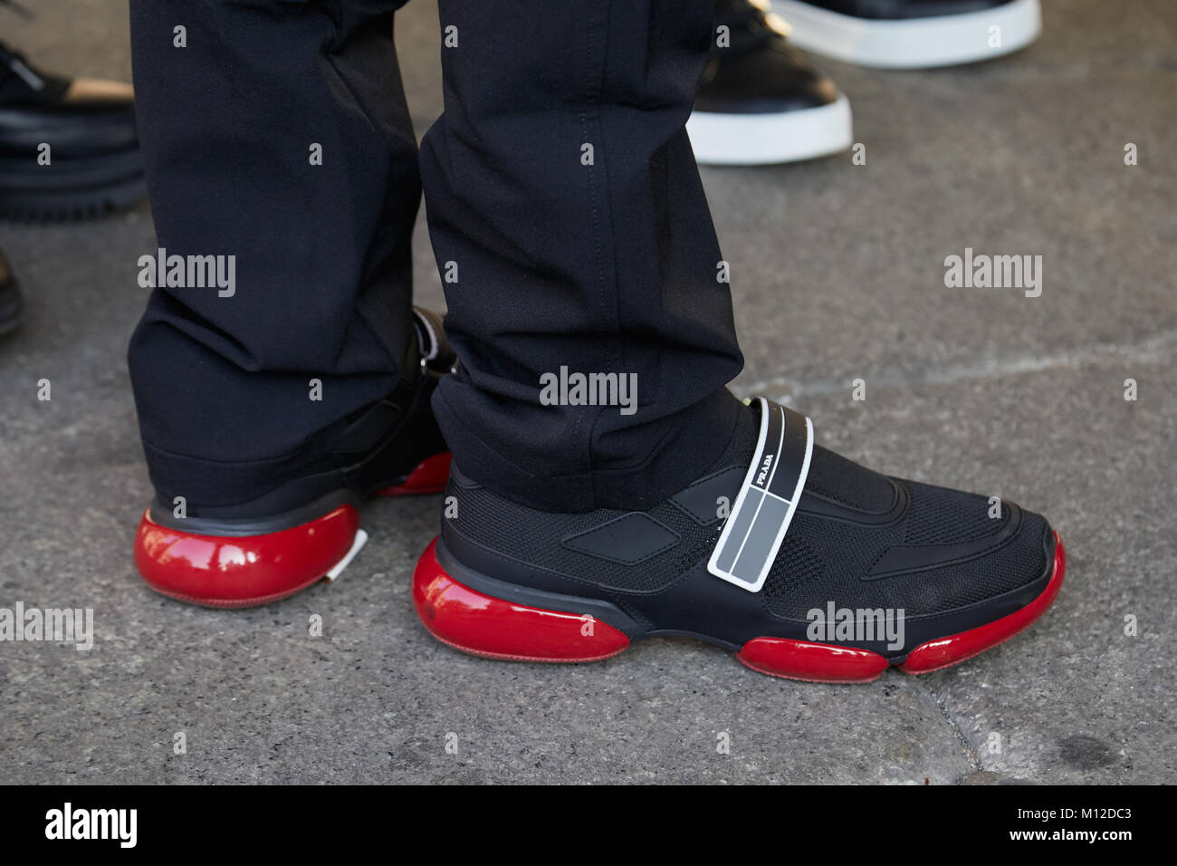MILAN - JANUARY 14: Man with black and red Prada shoes before MSGM Stock  Photo - Alamy