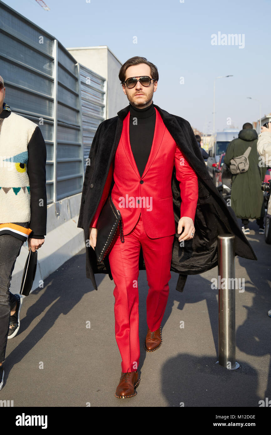 MILAN - JANUARY 14: Man with Alpha Industries blue bomber jacket and red  Louis Vuitton Supreme pouch before MSGM fashion show, Milan Fashion Week  stre Stock Photo - Alamy