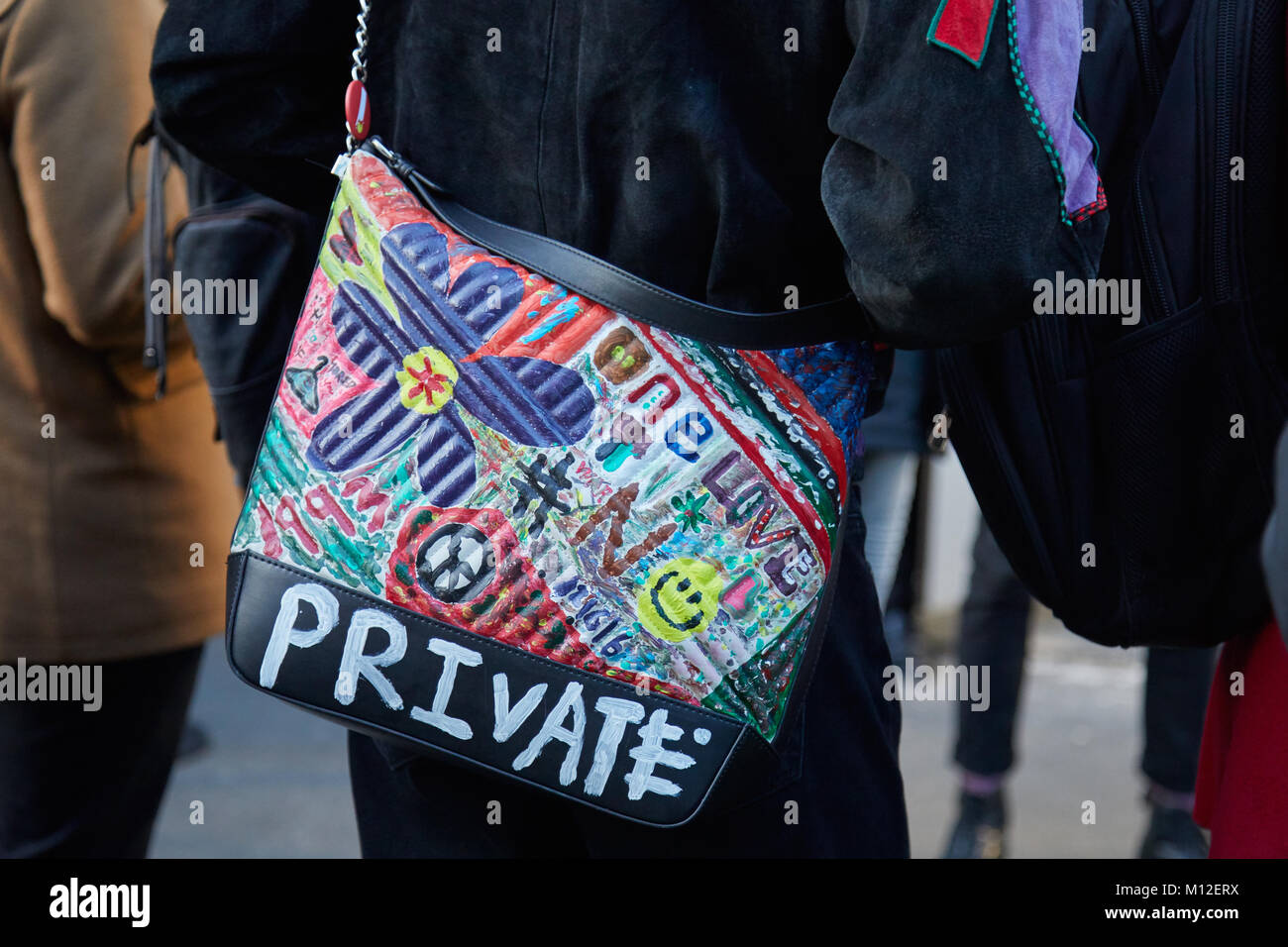 Milan January 14 Man With Black Leather Bag With Colorful Stock