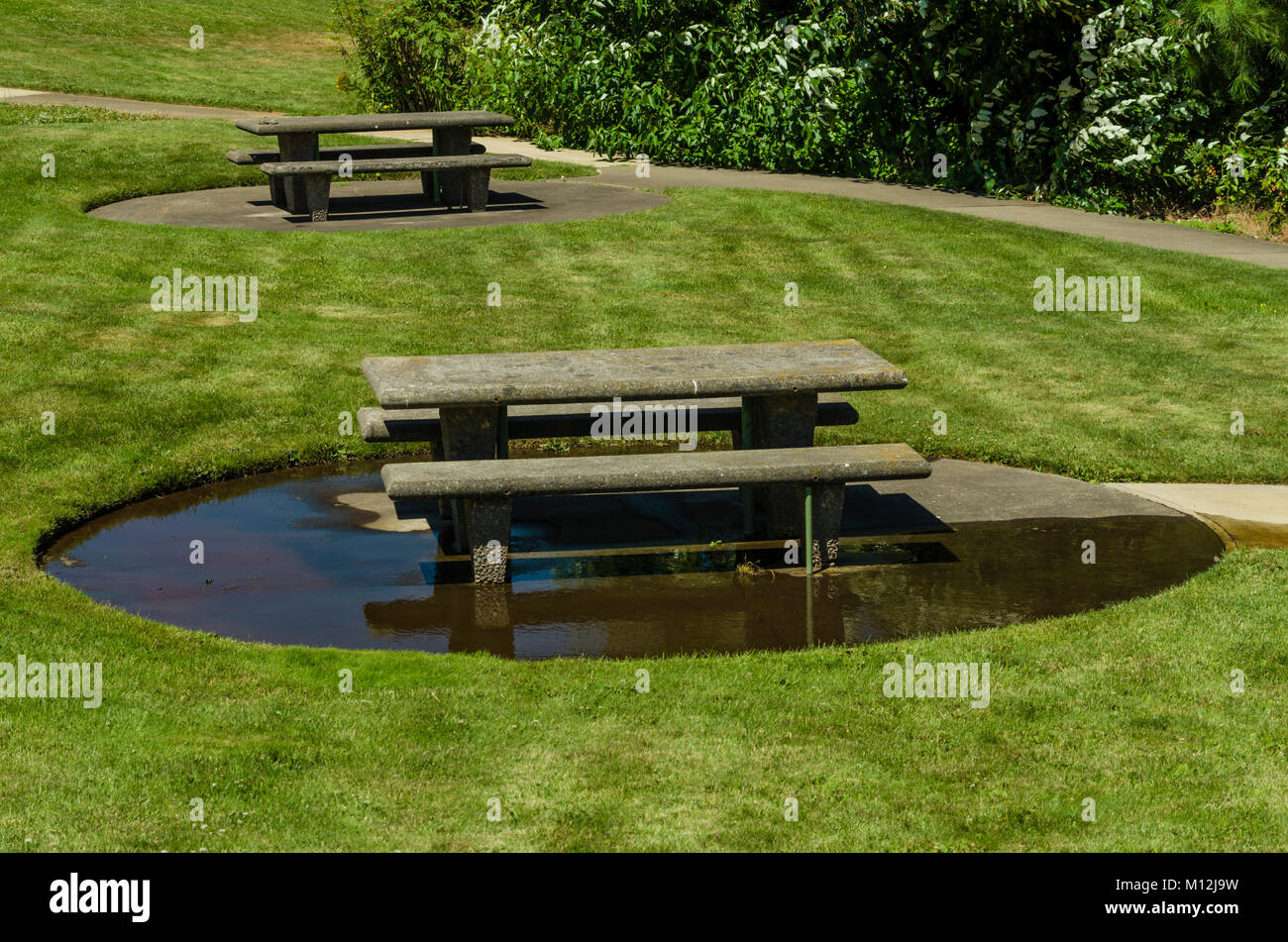 Concrete Picnic Benches At Roadside Rest Area Stock Photo