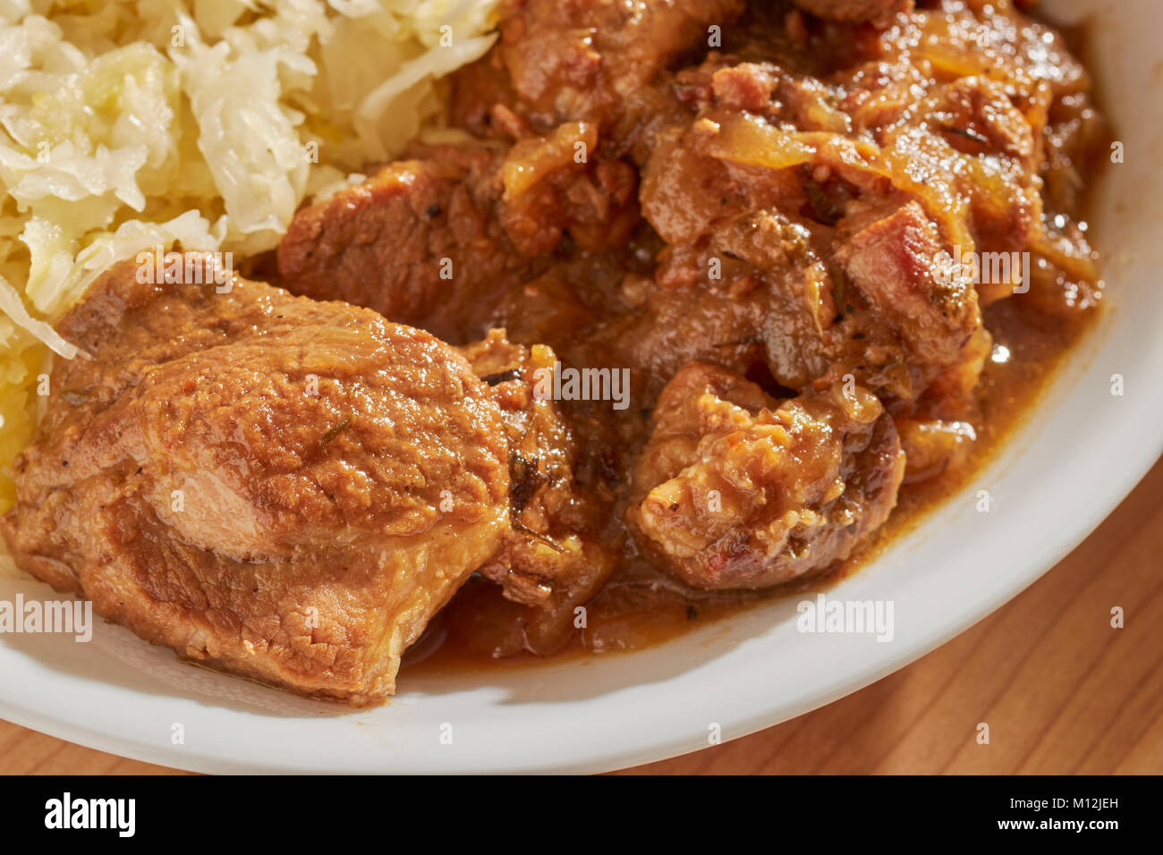Pennsylvania Dutch style braised pork and sauerkraut, a traditional dish on New Year's Day Stock Photo