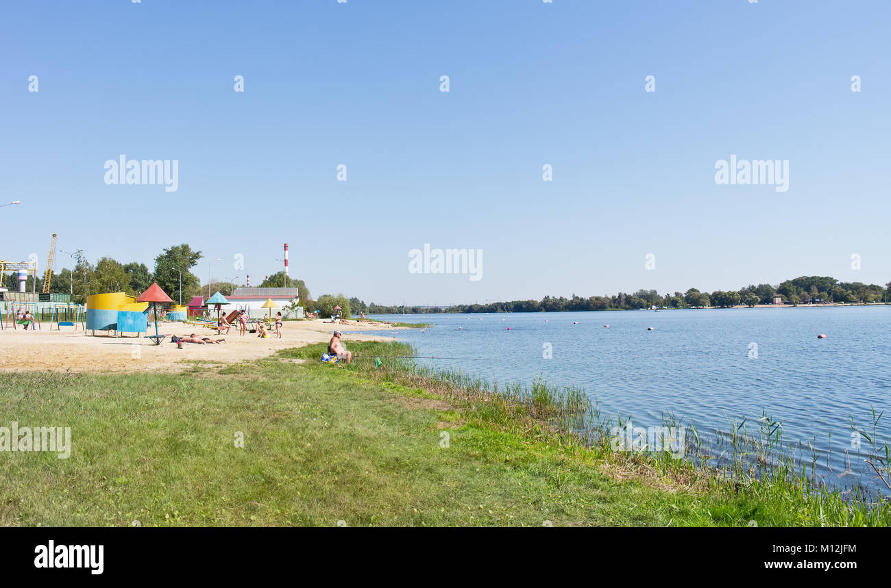 BELGOROD, RUSSIA - August 30.2016: Townspeople sunbathe on the city beach on the river Seversky Donets Stock Photo