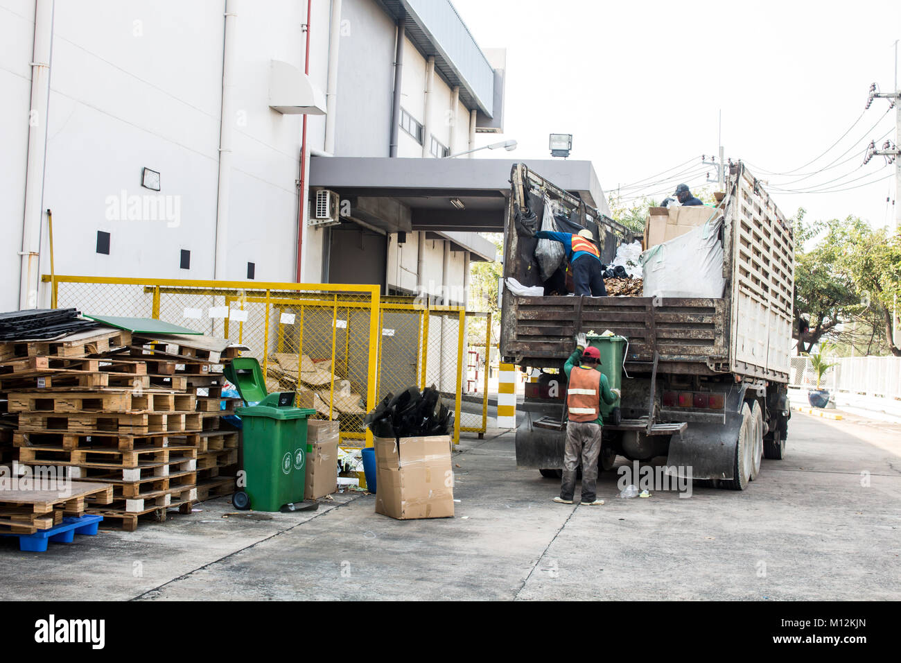 Waste Management, The garbage truck with worker Stock Photo Alamy