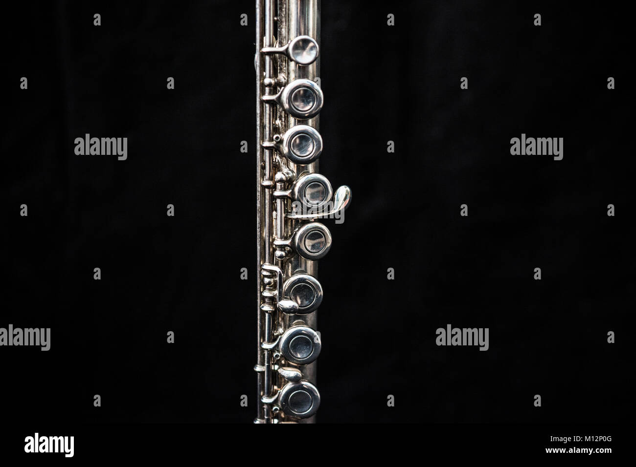 Close up of a transverse flute isolated in black Stock Photo Alamy