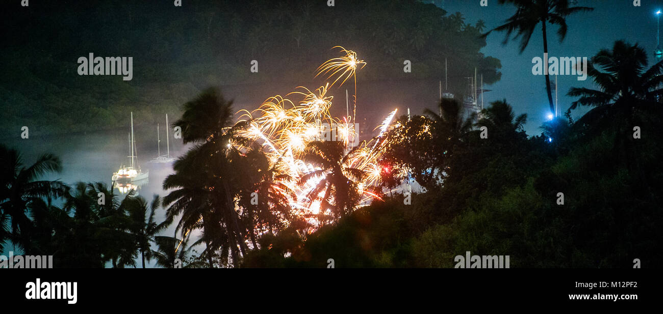 Fireworks on New Year's Eve in a small inlet near Savusavu on Vanua Levu in Fiji. Stock Photo