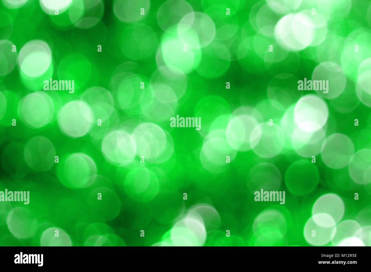 Green defocused bokeh background. St Patricks Day concept. Stock Photo