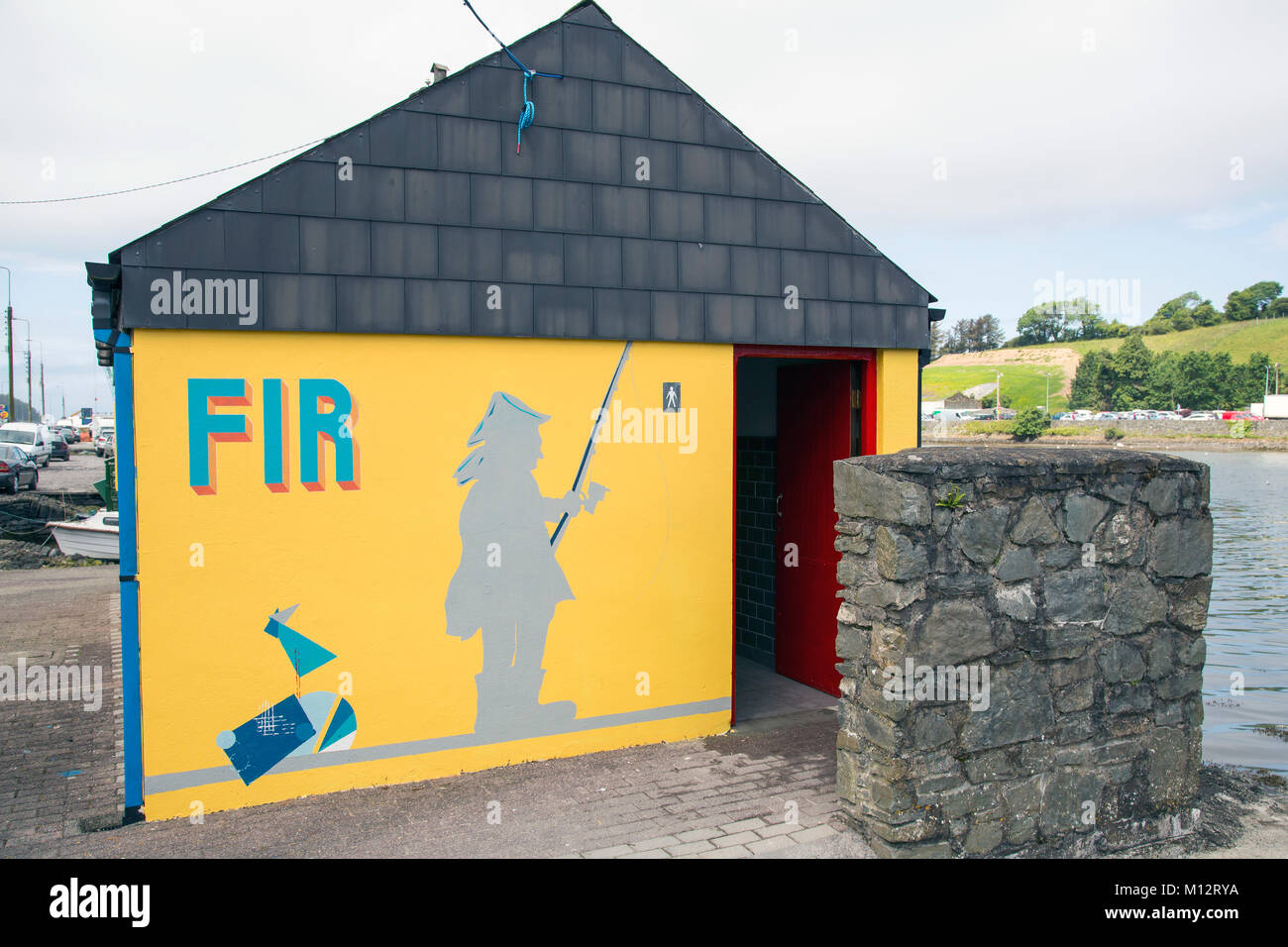 Brightly painted public toilets Bantry West Cork ireland Stock Photo