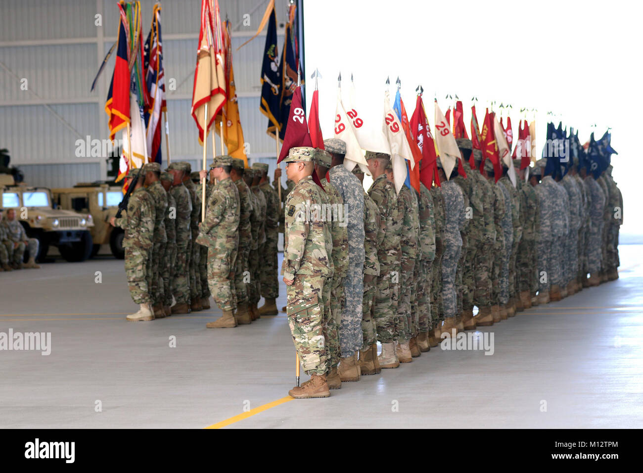 Soldiers of the 29th Infantry Brigade Combat Team stand in formation