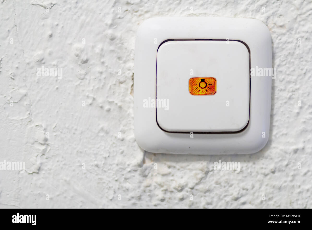 Closeup of touch button light switch on white wall Stock Photo Alamy
