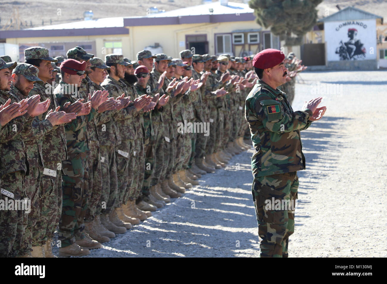 Students from the 24th Commando Qualification Course applaud during ...