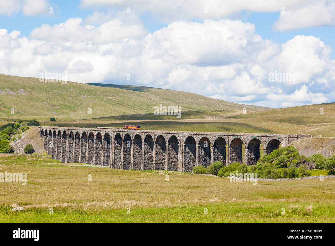 The Ribblehead Viaduct or Batty Moss Viaduct carries the Settle-Carlisle Railway across Batty Moss in the valley of the River Ribble at Ribblehead, in Stock Photo